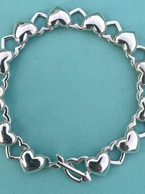 Tiffany & Co. Sterling Silver Arrow & Interlocking Heart Links Toggle Bracelet